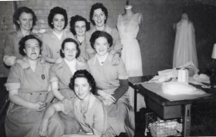 My nan and her colleagues at the textile factory (middle row, right), c.1950